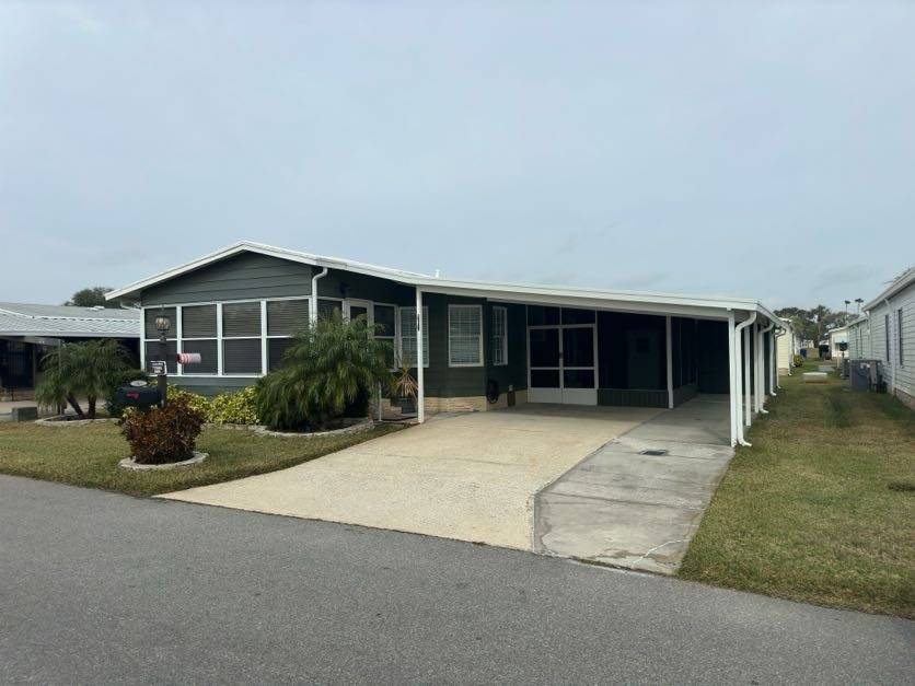 Winter Haven, FL Mobile Home for Sale located at 165 Greenview Drive Swiss Golf & Tennis